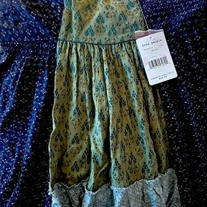 Free people sleeveless tunic size L new with tags.